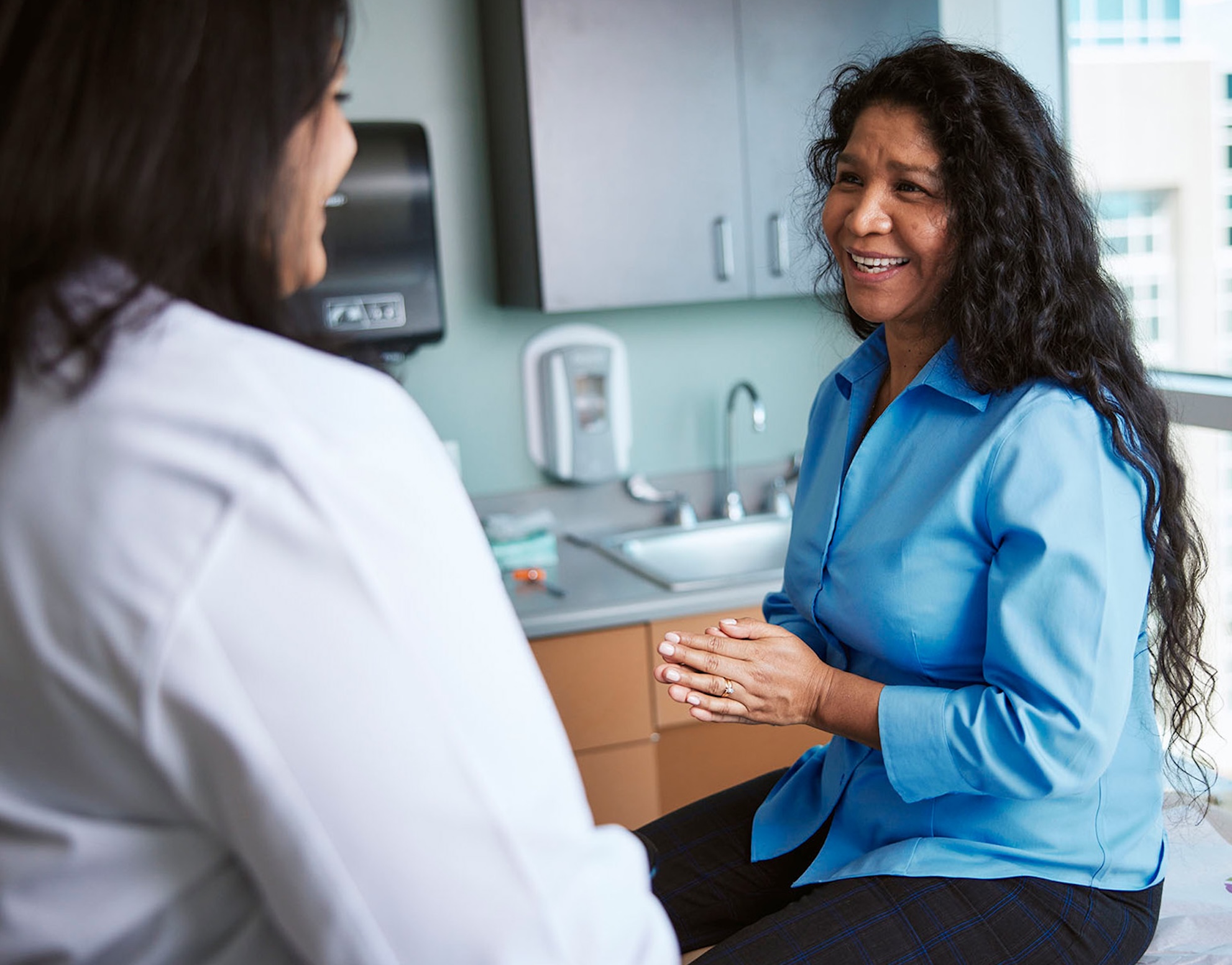 Dr. Arora talking to a patient